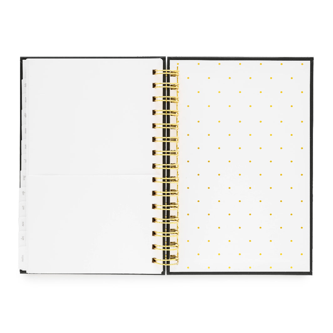 Interior Cover with elegant gold dot design.