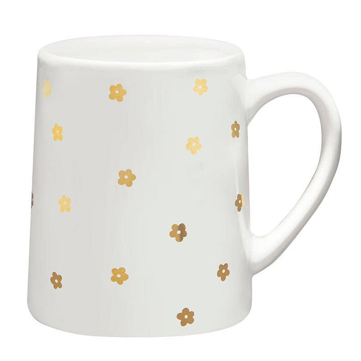 Ceramic artisan flower mug with metallic gold floral design.