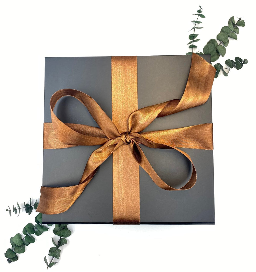 Large Black Magnetic Closing World of Gifting Gift Box wit Copper Colored Satin Ribbon.