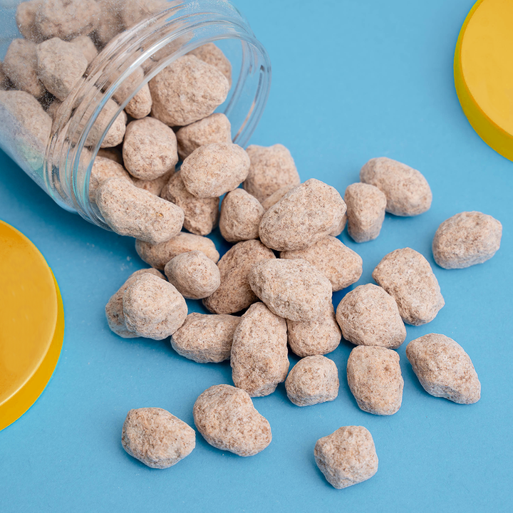 Close-up of Cinnamon Spice Almonds with a golden brown cinnamon coating.