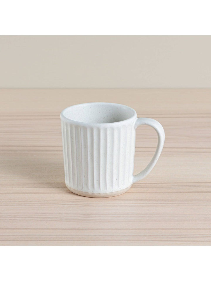 Hand-thrown and dipped Ceramic Ribbed Mug.