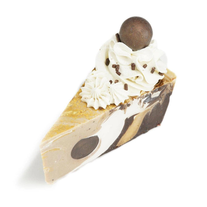 Chocolate Swirl Cake Soap topped with whipped cream, chocolate drop, and sprinkles.