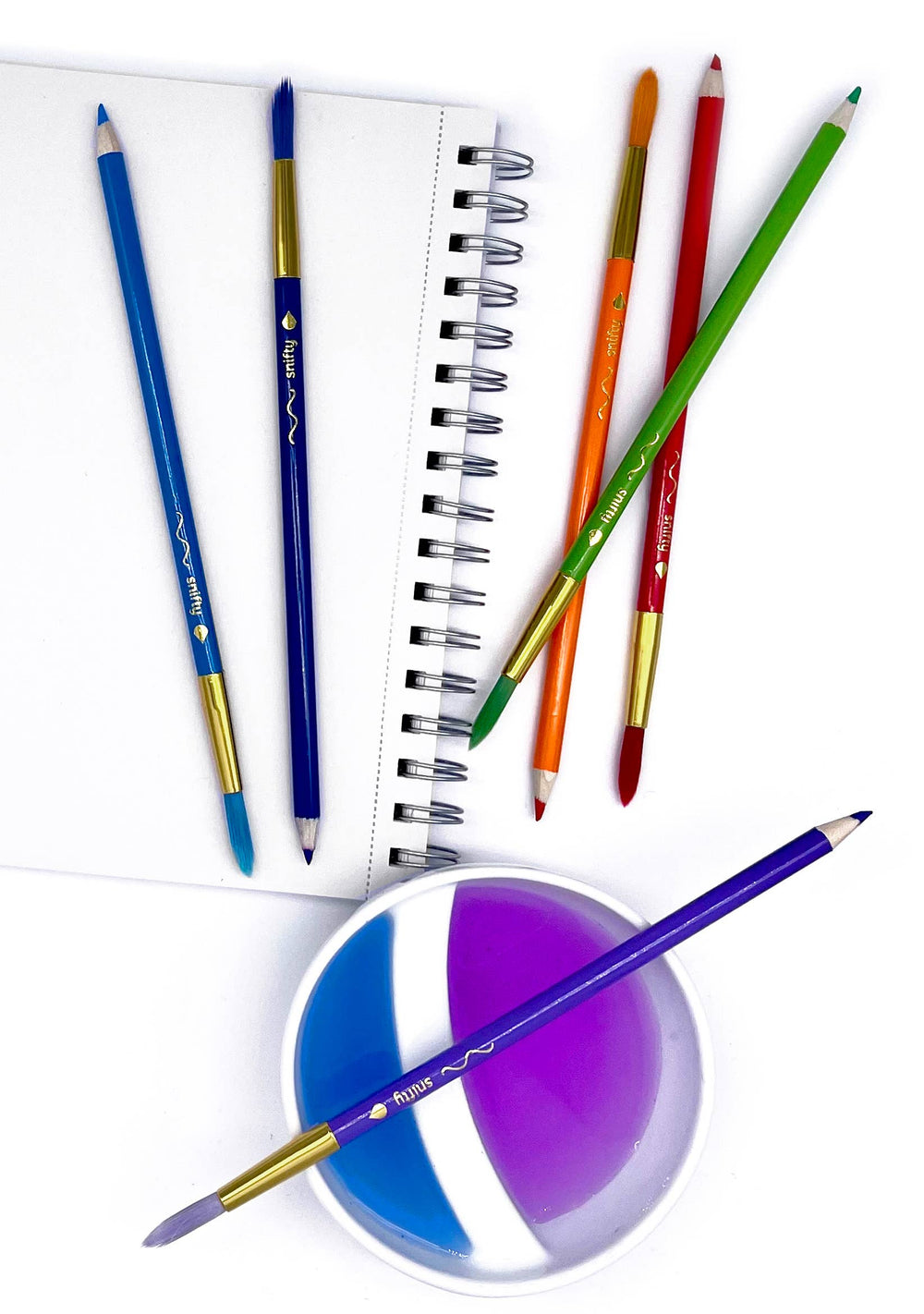 Close-Up of Double-Ended Design:  Colorbrush watercolor pencils and paintbrush showing the pencil tips and paintbrush tips.