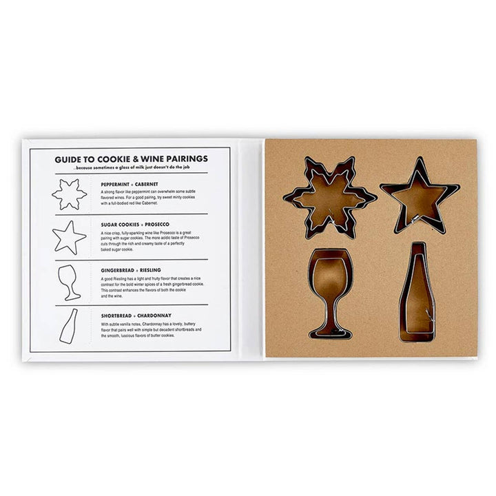 Set of 8 Christmas cookie cutters with wine pairing guide, ideal holiday gift.