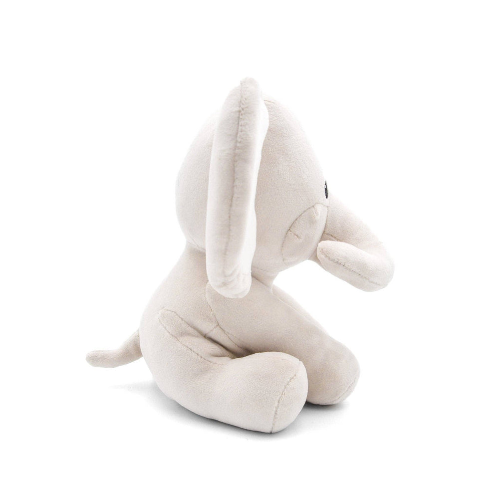 Side angle of Ella plush dog toy highlighting soft texture and floppy ears.