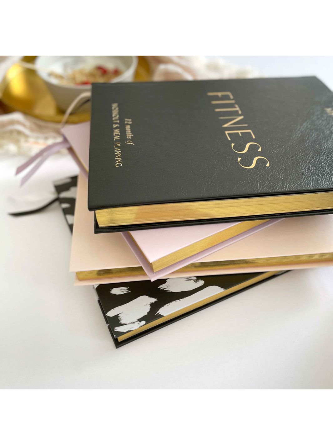 My Daily Fitness Planner side view showing gilt edges on pages.