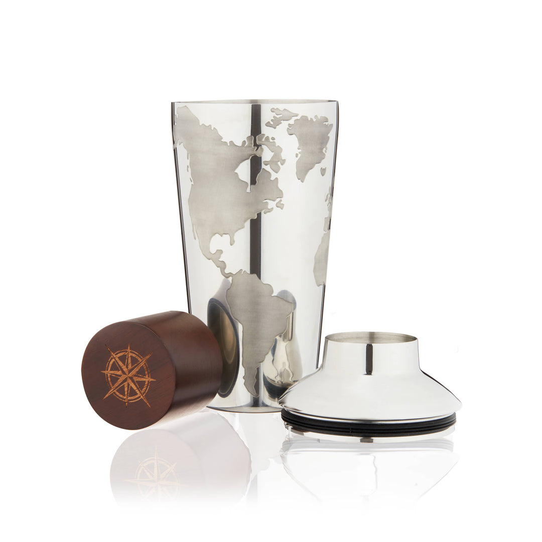 Close-up of Globe Themed Cocktail Shaker showing distressed world map and wood cap with compass.