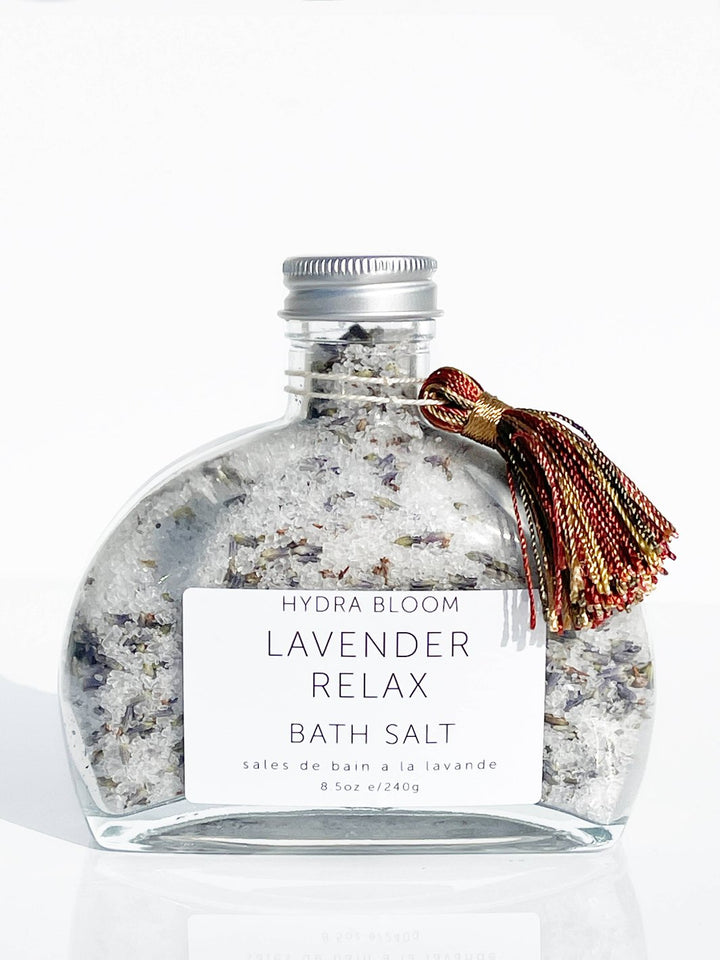 Jar of Lavender Relax Bath Salts by Hydra Bloom, featuring a luxurious blend of Epsom and Dead Sea salts with organic lavender flowers.