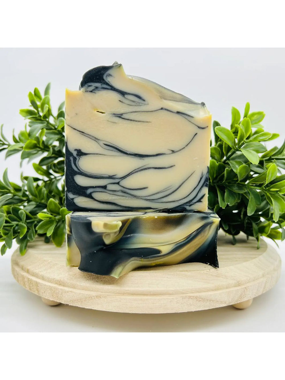 Mahogany Charcoal Soap Bars showcasing sleek black and gray tones.