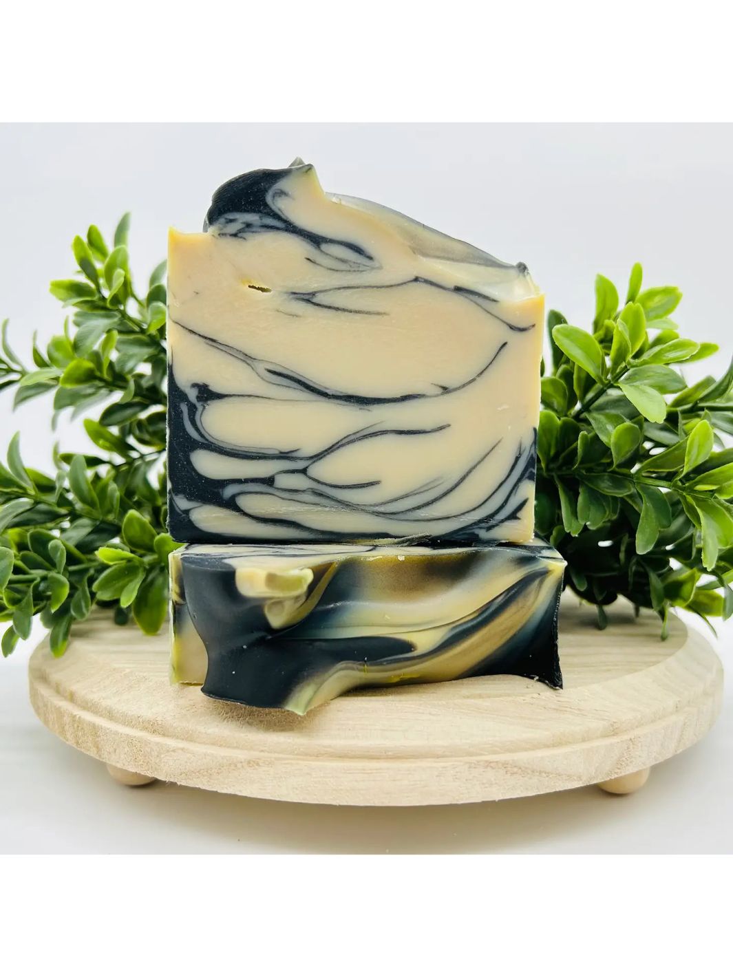 Mahogany Charcoal Soap Bars showcasing sleek black and gray tones.