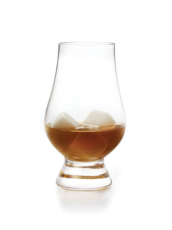 Whiskey glass with three marble whiskey stones. 