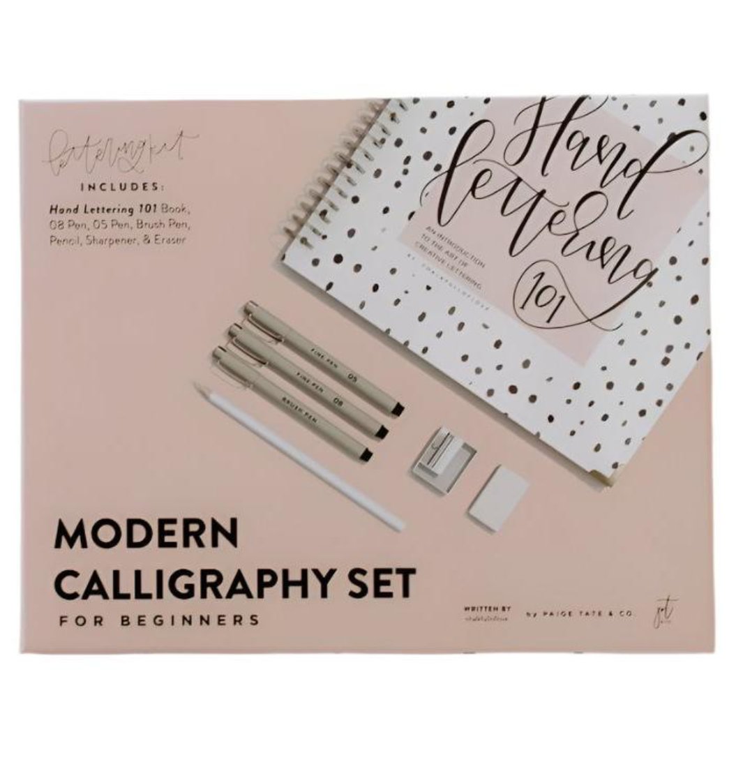 Complete Modern Calligraphy Set: All items in the kit displayed, including the book, pens, brush pen, pencil, eraser, and sharpener.