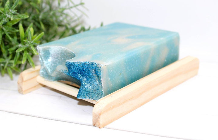 Oceanside Air Bar Soap in a bamboo slatted soap dish.