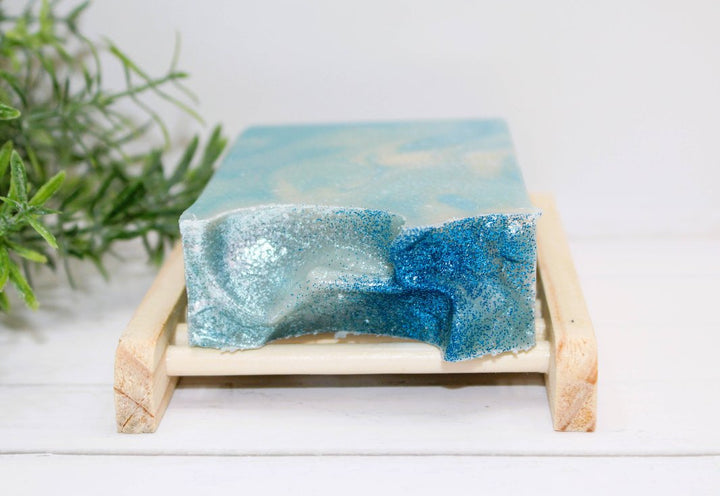 Close-up of the top of the Oceanside Air Soap Bar showcasing aqua swirls and ocean-inspired design.