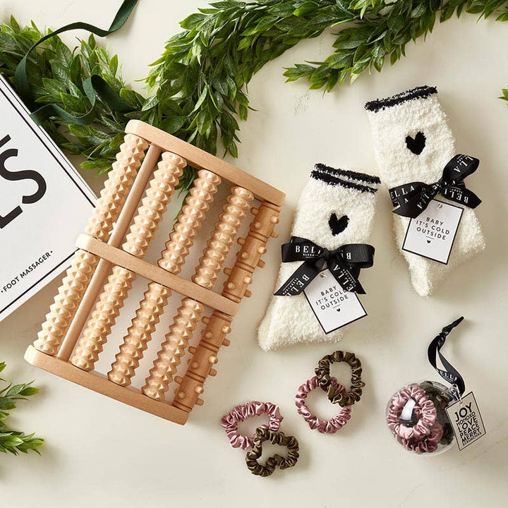Pair of Cozy Socks displayed with hair ties in ornament.