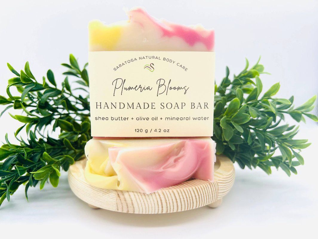 Plumeria Blooms Handcrafted soap with eco-friendly packaging.