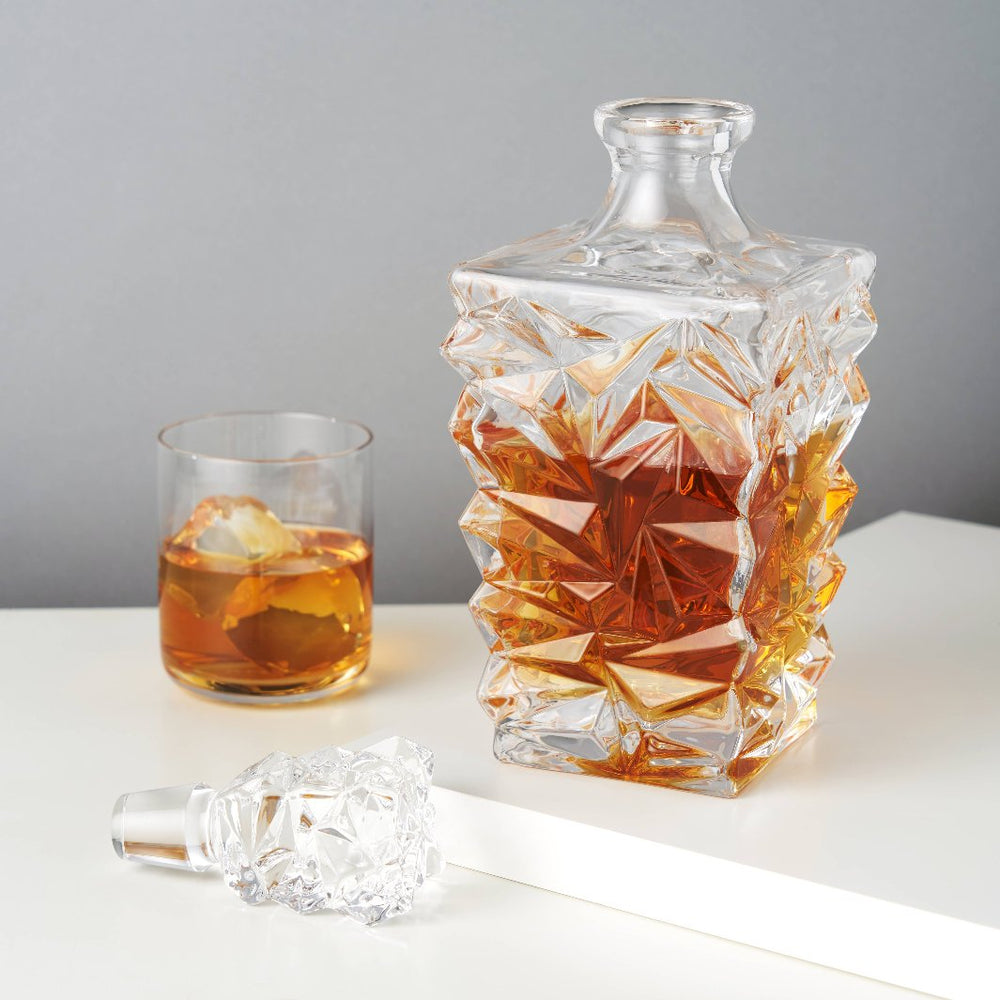 Prism Crystal Whiskey Decanter is filled with whiskey, demonstrating its capacity and aesthetic appeal for serving fine spirits.