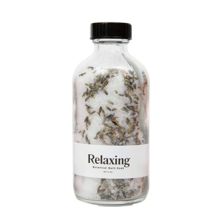 Relaxing Botanical Bath Soak in a 12oz jar, made with Epsom salt, Dead Sea salt, and lavender buds, perfect for a soothing bath experience. Great for spa gift sets and self-care.