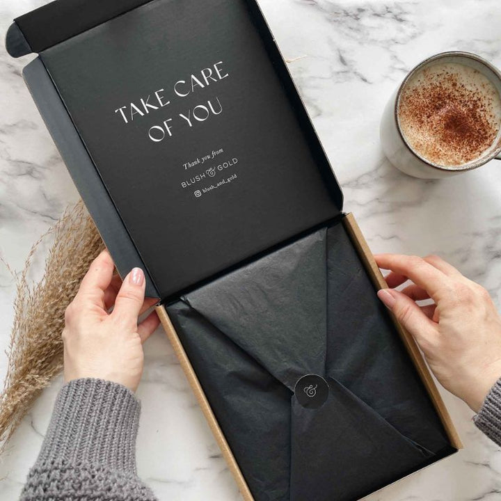My Daily Self-Care Journal comes wrapped in its own gift box. Inside cover reads "Take Care of You".