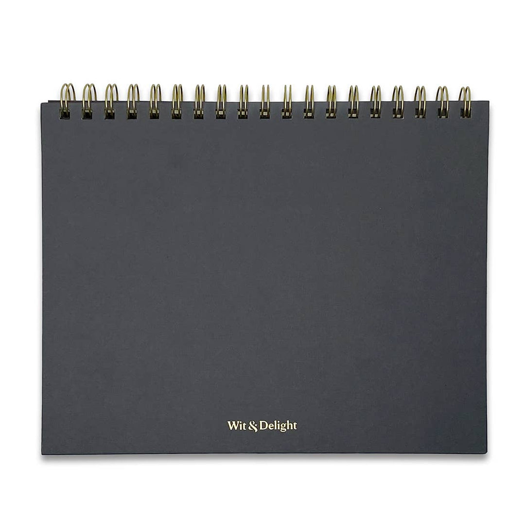 Back cover shows brand in gold lettering "Wit & Delight".