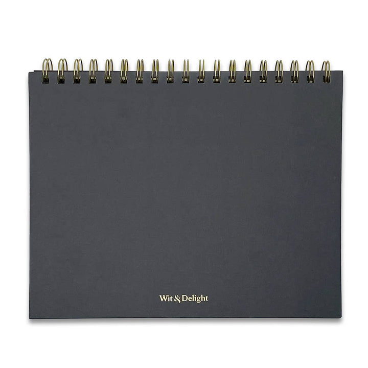 Back cover shows brand in gold lettering "Wit & Delight".