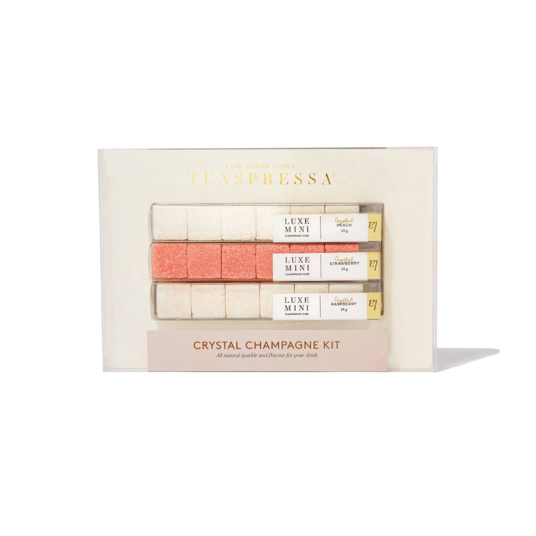 Champagne Cocktail Crystal Kit with shimmery sugar cubes in peach, strawberry, and raspberry flavors.