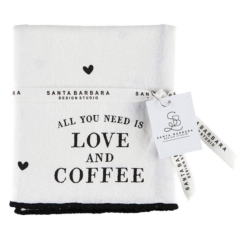White Tea Towel with small, scattered black hearts and black script that states "All You Need Is Love And Coffee". Found in World of Gifting's Love & Coffee Luxury Gift Box.